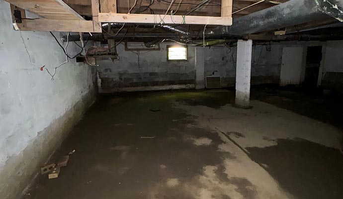 Basement floor damaged by water