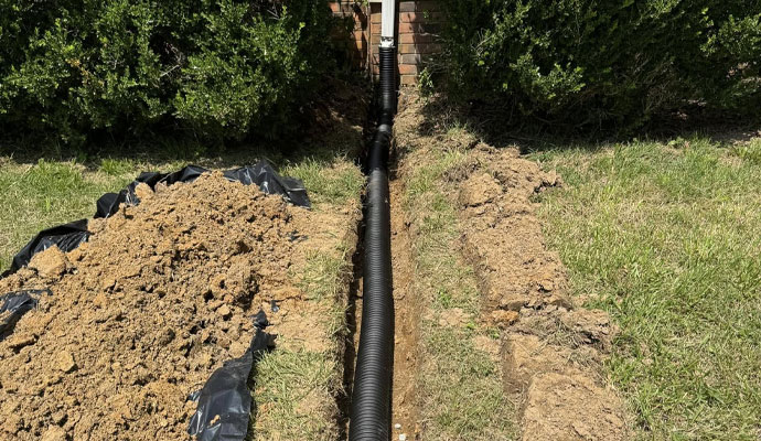 Foundation moisture control for compacted soil