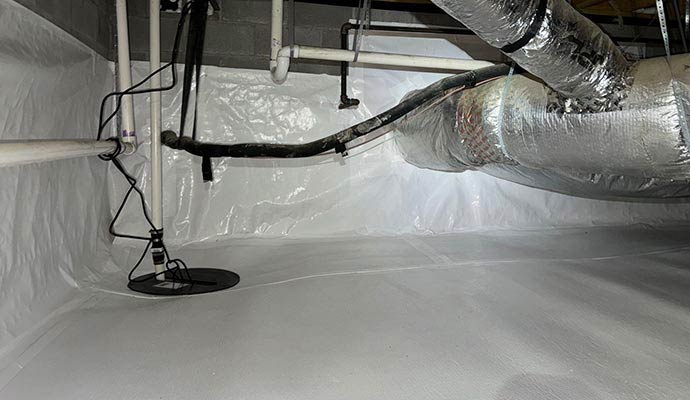 Installed sump pump in crawl space