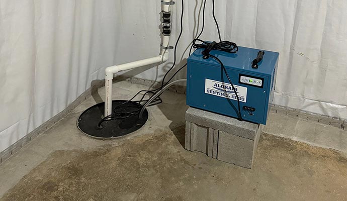 Installed sump-pump with battery backup system